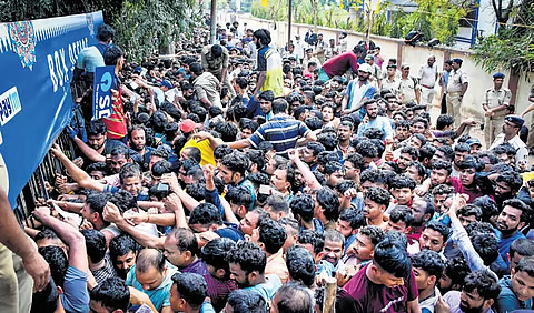 Massive rush for India vs England 2nd ODI tickets causes chaos, leading to a stampede-like situation as fans scramble to secure their seats. Stay updated!